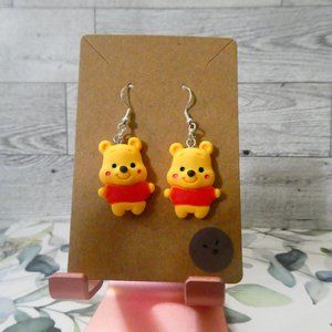 Winnie the Pooh fish hook earrings.